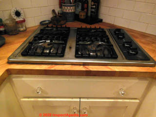 Amana gas cooktop being replaced by Bertazzoni (C) InspectApdia.com Trish