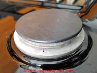 Bosch gas cooktop burner cap properly installed (C) Daniel Friedman at InspectApedia.com