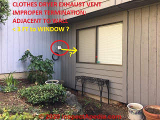 Clothes dryer exhaust vent terminates too close to a wall and probably too close to a window (C) InspectApedia.com Lucy