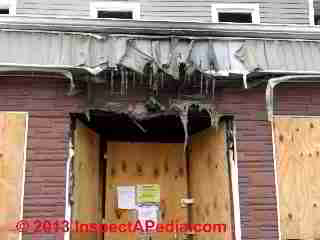 Fire damaged vinyl siding (C) Daniel Friedman