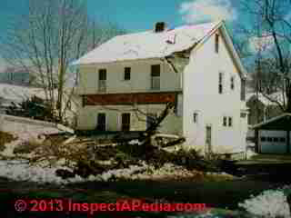 Windstorm caused Tree damaged home (C) Daniel Friedman