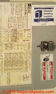 Modular office building labeling in electrical panel (C) InspectApedia.com RS