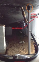 ABS & PVC Pipe under a mobile home: are the pipe curves or bends a concern? (C) InspectApedia.com Mike
