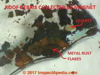 Rust flakes found in roof debris from a Houston Texas roof gutter (C) InspectApedia.com
