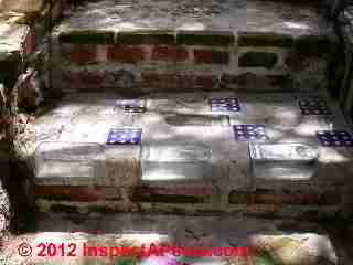 Masonry stair trip hazard using glass - slippery when wet (C) Daniel Friedman