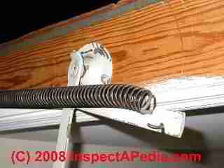 Bad attic pull down spring arm (C) Daniel Friedman