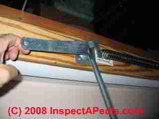 Bad attic stair spring arm (C) Daniel Friedman