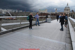 Inwards curved horizontal cable guardrail on a bridge over the Thames, London (C) Daniel Friedman Inspectapedia.com