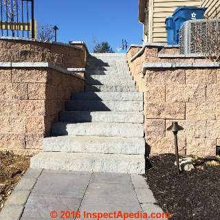 New masonry stairs needing a handrailing (C) InspectApedia 