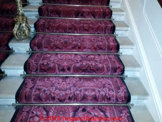 Loose stair carpet held by rods (C) Daniel Friedman