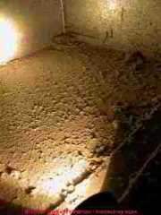 Photograph of dirt collecting in a return air plenum