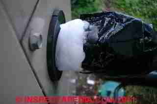 Photograph of ice formation on the suction line of an
air conditioner compressor/condenser unit in Florida -- Mark Cramer