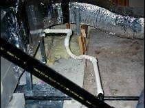 Photograph of  cooling system condensate leaks onto heat exchanger