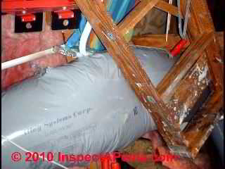 Photograph of  heat-deterioration of Goodman Gray Flex Duct in an attic