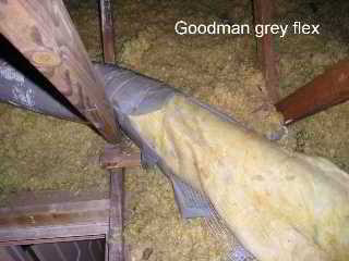 Photograph of  heat-deterioration of Goodman Gray Flex Duct in an attic