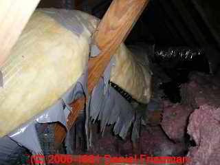 Photograph of  heat-deterioration of Goodman Gray Flex Duct in an attic