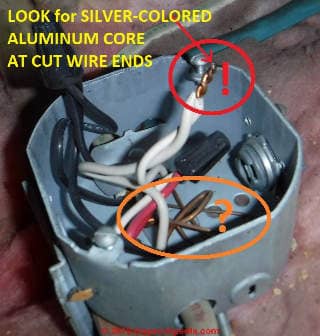 Copper clad aluminum wiring in-situ in an electrical box in a U.S. home (C) InspectApedia.com Lawrence Transue 