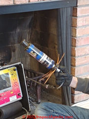 ChimScan flue inspection camera being prepared for use in a Minnesota home (C) InspectApedia.com A Church