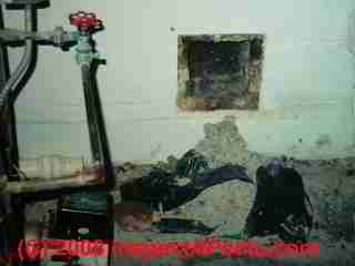 Debris at a chimney cleanout (C) Daniel Friedman
