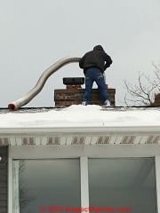 Inserting a stainless steel liner into a gas fired heating boiler flue, Two Harbors MN 2022 (C) InspectApedia.com A/H Church