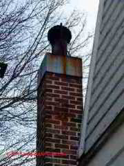 Red rust stain at chimney traced to rusting cap (C) Daniel Friedman