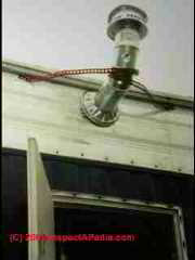 Unsafe gas vent on a mobile home heater (C) Daniel Friedman 