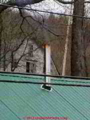 Missing rain cap on factory built metal chimney, New Hampshire (C) Daniel Friedman