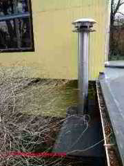 Single wall  metal fireplace chimney, too short (C) D Friedman