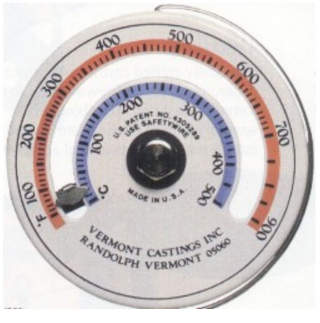 Older Vermont Castings woodstover thermometer reading up to 900 °F at InspectApedia.com