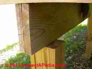 Deck girder set in place atop posts (C) Daniel Friedman