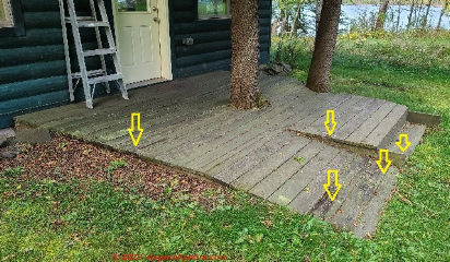 Deck board rot on a ground level deck, Green Cabin, Two Harbors MN  (C) Daniel Friedman at InspectApedia.com 