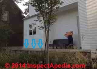 Areas of leaks along abutment of concrete porch to house (C) InspectApedia SK
