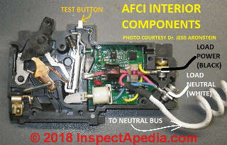 AFCI interior view with wiring connections (C) InspectApedia.com Jess Aronstein