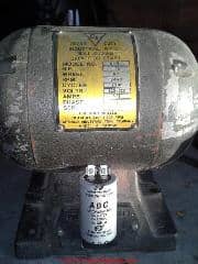 Old bench grinder motor (C) InspectApedia.com CWHONKAHI