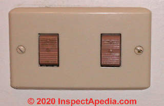 Double rocker low voltage lighting switch (C) InspectApedia.com David Goldstein