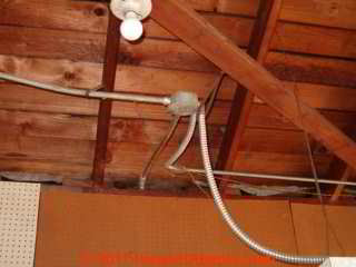 Rigid and flexible metallic electrical conduit in an older home (C) Daniel Friedman