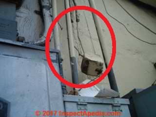 Electrical conduit wiring & box damage (C) InspectApedia.com