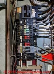 Arc flash burn marks on the interior of a GTE/Sylvania zinsco-type circuit breaker panel (C) InspectApedia.com CR