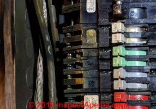 Arc flash burn marks on the interior of a GTE/Sylvania zinsco-type circuit breaker panel (C) InspectApedia.com CR