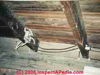 Knob and tube wiring with illegal extension (C) Daniel Friedman