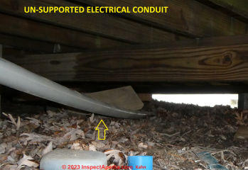 Damaged, improper, possibly unsafe plastic electrical conduit work in Suffern, NY (C) InspectApedia.com Kahn DovBer