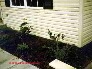 Siding at ground (C) Carson Dunlop