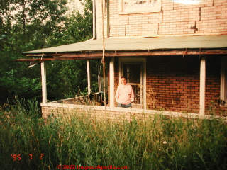 Asphalt shingle siding on an abandoned New York Home (C) Daniel Friedman &  Barbara Whan