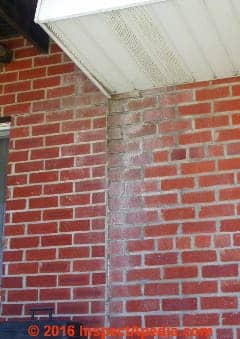White stains on brick from aluminum or vinyl siding or trim (C) Daniel Friedman