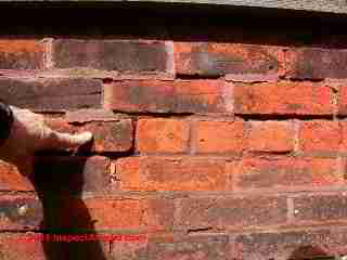 Brick wall tuck pointing bad job (C) Daniel Friedman