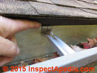Drip edge improperly installed or gutter poorly installed - water runs behind gutter (C) Daniel Friedman
