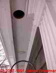 Round soffit intake vents © D Friedman at InspectApedia.com 