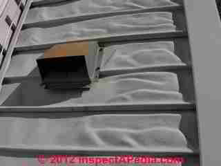 Heat damaged vinyl siding (C) Daniel Friedman