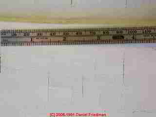 Photo of paint failure due to inappropriate use of skim coat with crack filler