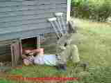 D Friedman inspecing with broken leg Aug 2003